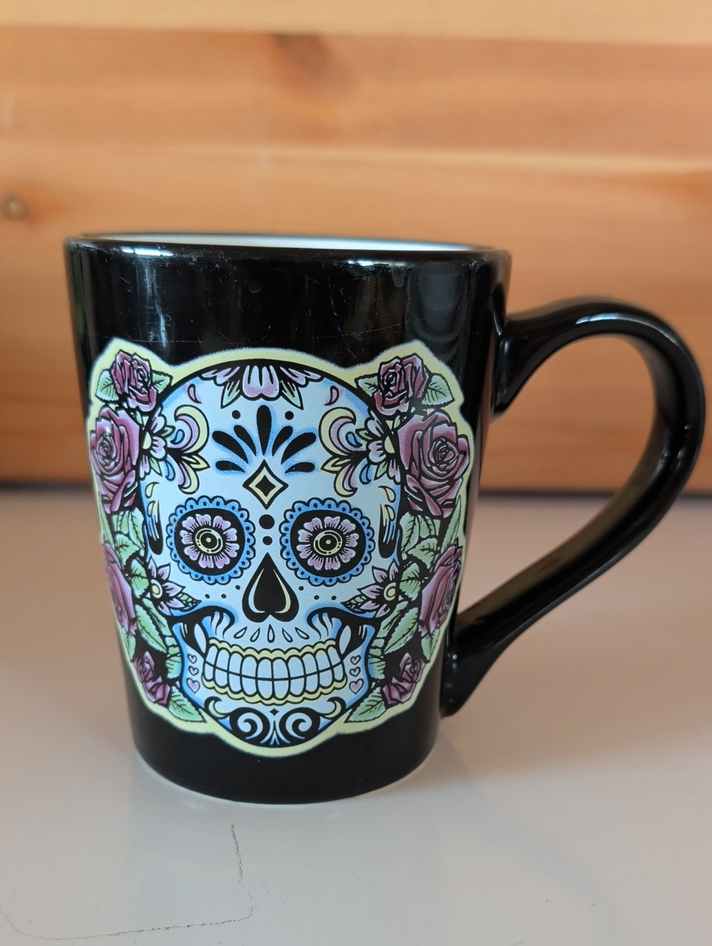 Black Sugar Skull Ceramic Coffee/Tea Mug with Pink Floral Accent.